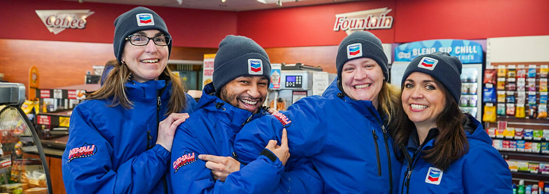 Employees at a Denali Express Chevron Network Store.