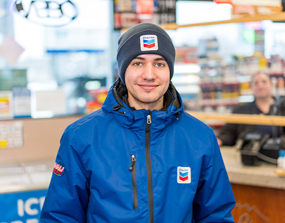 A Denali Express Chevron Network employee in store.