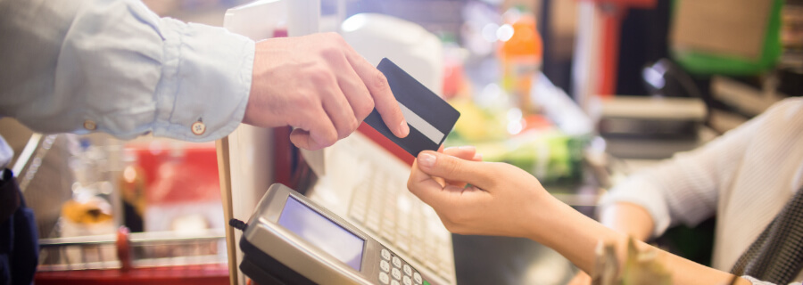 Customer uses a Carrs/Safeway Rewards card at checkout to save at the pump.